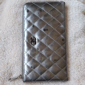 CHANEL Silver Quilted Wallet with Logo Charm